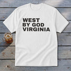 White t-shirt with bold black text reading "WEST BY GOD VIRGINIA".