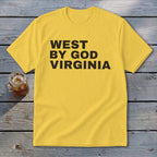 Yellow t-shirt with black text reading "WEST BY GOD VIRGINIA".