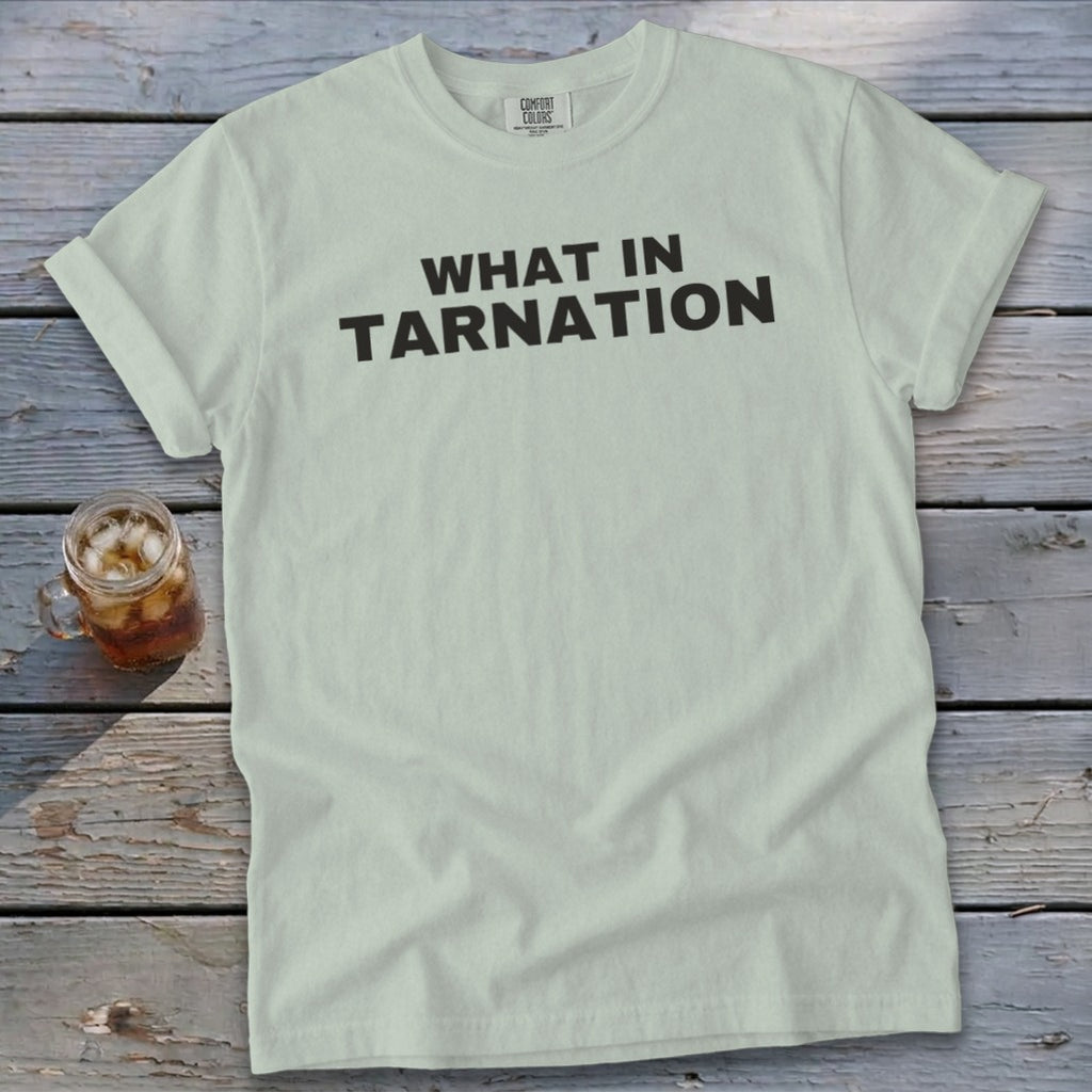 Pale green t-shirt with "WHAT IN TARNATION" text and a glass of iced tea.