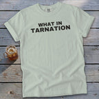 Pale green t-shirt with "WHAT IN TARNATION" text and a glass of iced tea.