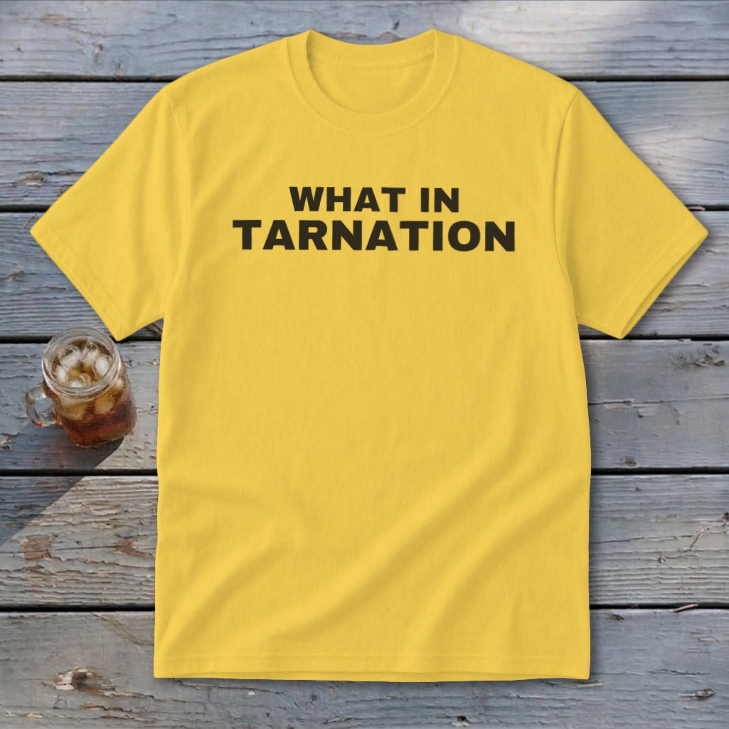 Yellow t-shirt with "WHAT IN TARNATION" text.