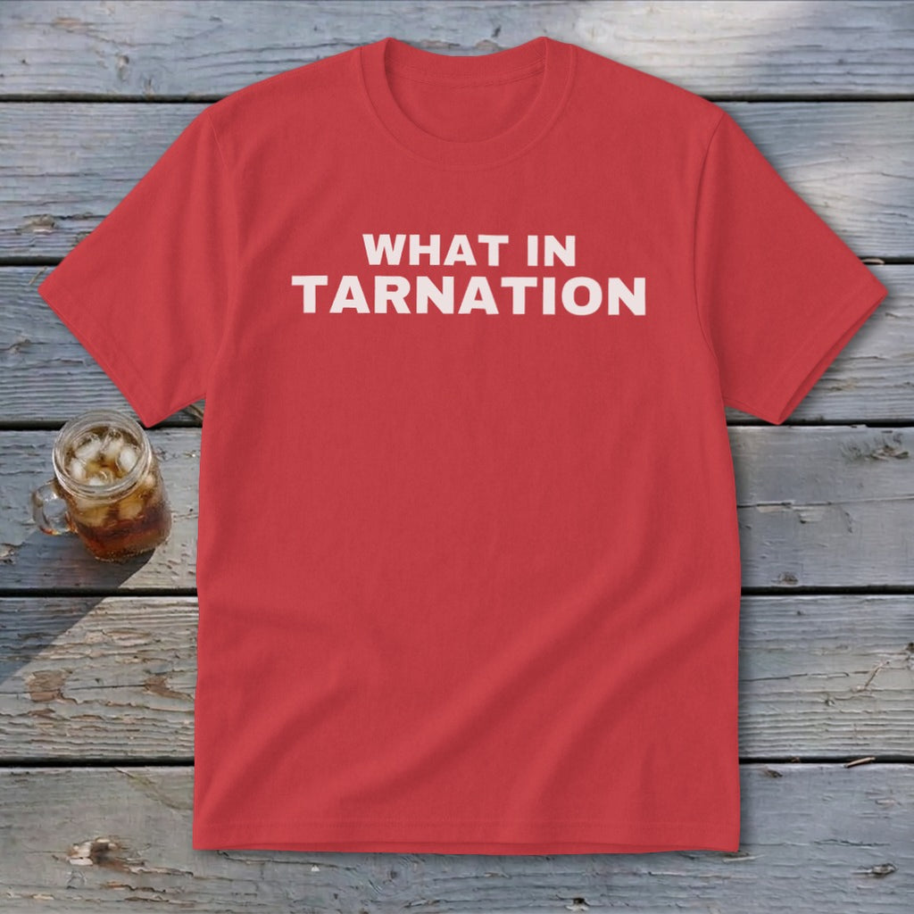 Red t-shirt with "WHAT IN TARNATION" printed in white.