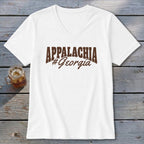White v-neck t-shirt with brown "APPALACHIA #Georgia" graphic.