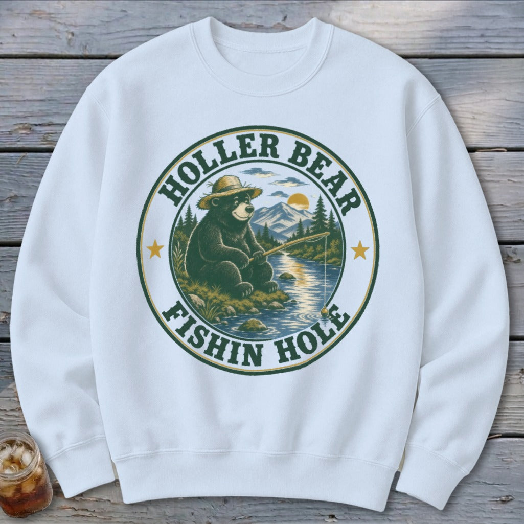 White sweatshirt with a circular graphic of a bear fishing in a stream.