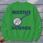 Green crewneck sweatshirt featuring a distressed graphic of a banjo with the text "MOUNTAIN ECHOES".