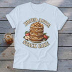 Light blue t-shirt with dried apple stack cake graphic and text.