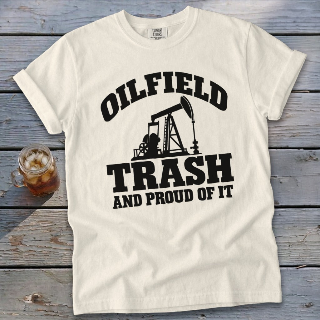 Cream t-shirt with black graphic "Oilfield Trash And Proud Of It" and pumpjack.