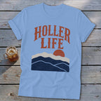Light blue t-shirt featuring a retro graphic with mountains, a sun, and the text HOLLER LIFE.