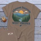 Tan t-shirt with "Almost Heaven West Virginia" text and mountain landscape graphic.
