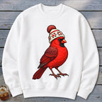 A white crewneck sweatshirt featuring a graphic of a red cardinal wearing a winter beanie.