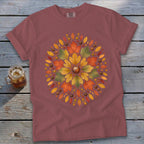 T-shirt with central autumn leaf and acorn mandala design.