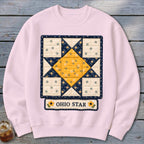 Light pink sweatshirt with a quilted Ohio Star design and floral accents.