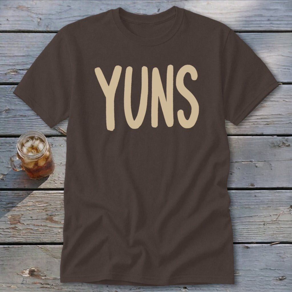 Brown t-shirt with tan "YUNS" text and a glass of iced tea.