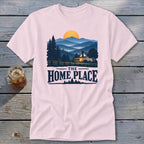 Pink t-shirt with mountain landscape, house, and text "THE HOME PLACE".