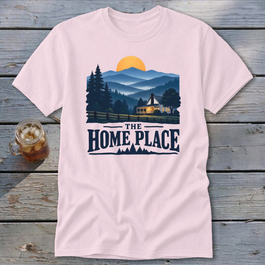 Pink t-shirt with mountain landscape, house, and text "THE HOME PLACE".