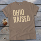 Brown t-shirt with "OHIO RAISED" in large beige text.