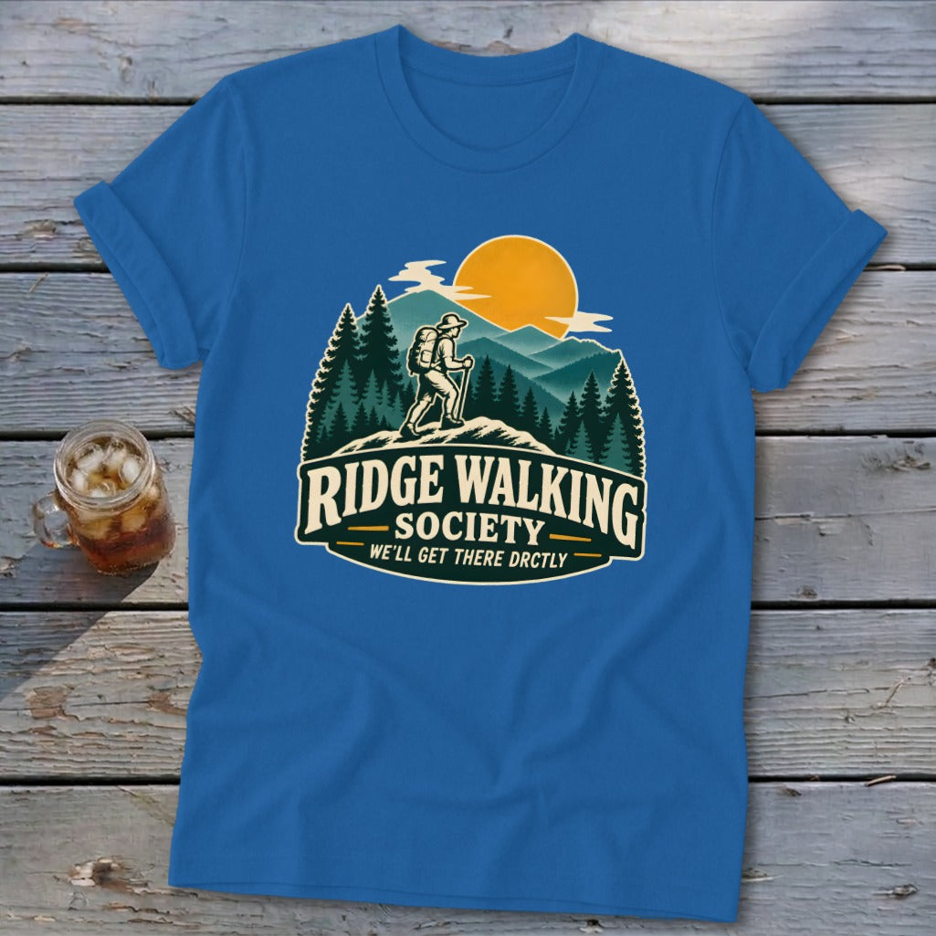 Blue t-shirt with "Ridge Walking Society" text and a hiker on a mountain landscape.