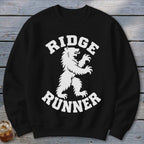 Black sweatshirt with white "Ridge Runner" text and bear graphic.