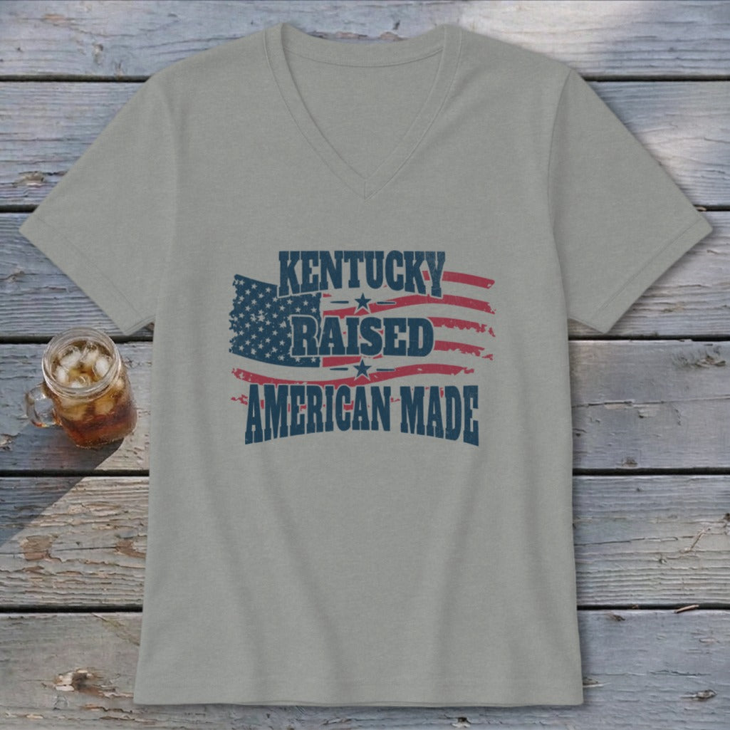 Light grey v-neck t-shirt with "Kentucky Raised American Made" text over an American flag design.