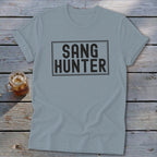 Light blue t-shirt with black text "SANG HUNTER" in a rectangular box.