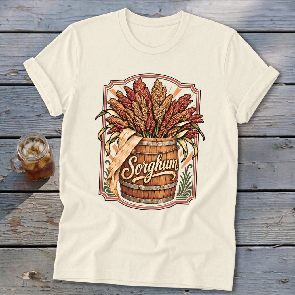 Barrel with sorghum stalks and cursive "Sorghum" text on a cream t-shirt.