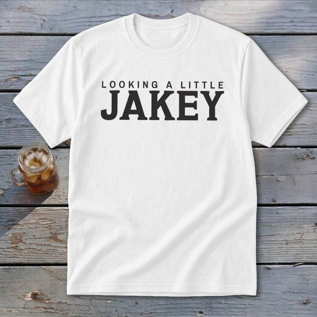 White t-shirt with black text reading "LOOKING A LITTLE JAKEY"