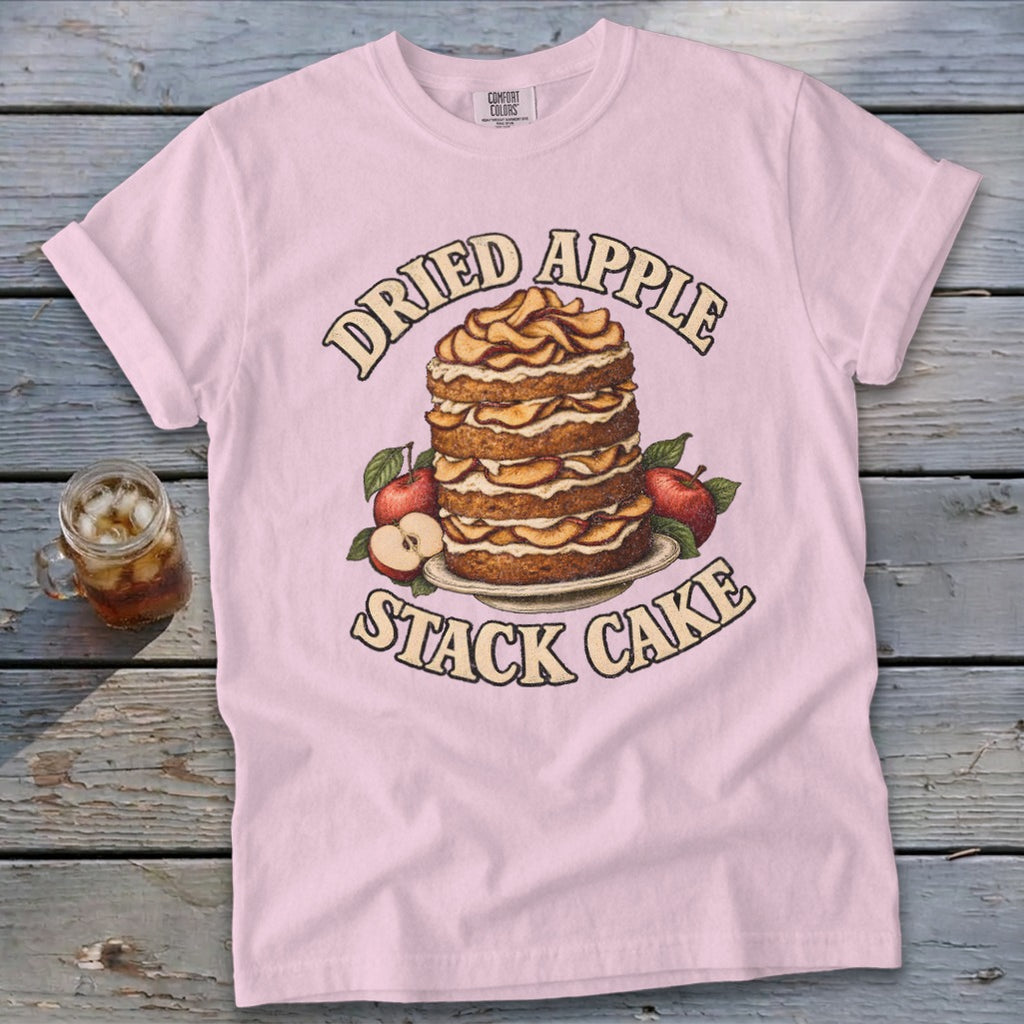 Pink t-shirt with "Dried Apple Stack Cake" graphic featuring a cake with apples.