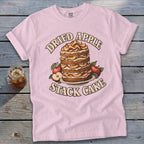 Pink t-shirt with "Dried Apple Stack Cake" graphic featuring a cake with apples.