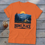 Orange t-shirt with a house, trees, mountains, and "The Home Place" text.