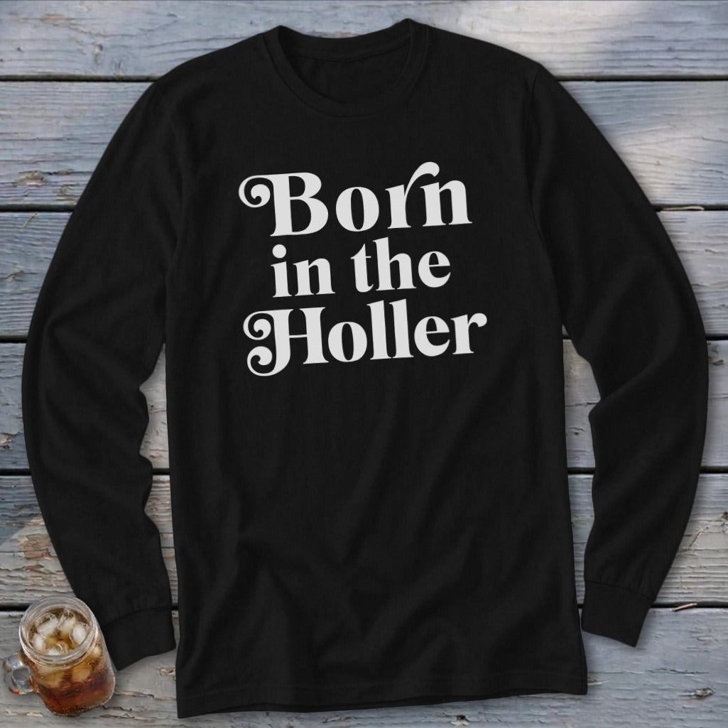 Black long sleeve shirt with white text "Born in the Holler."