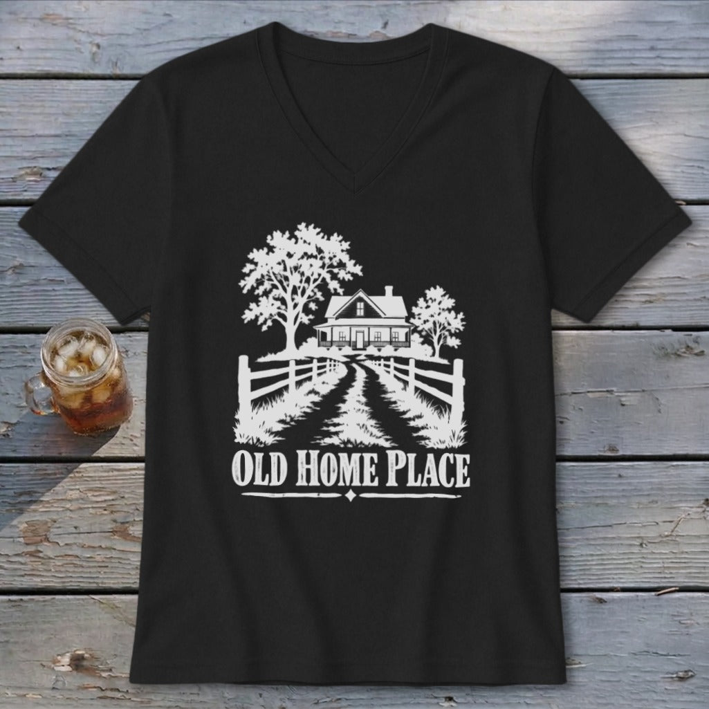Black t-shirt with white graphic of a farmhouse, trees, fence, and text "OLD HOME PLACE".
