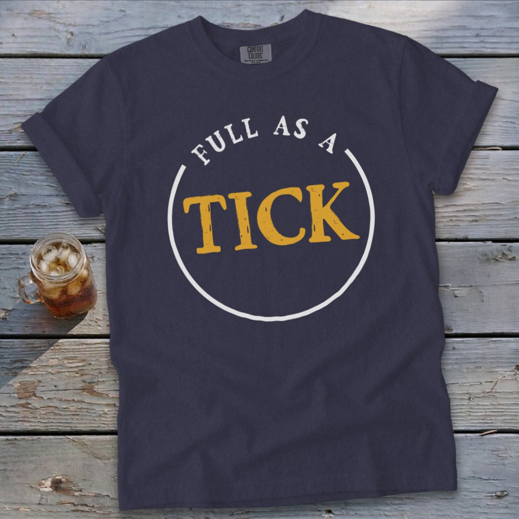 Navy t-shirt with white circle containing yellow text "FULL AS A TICK".
