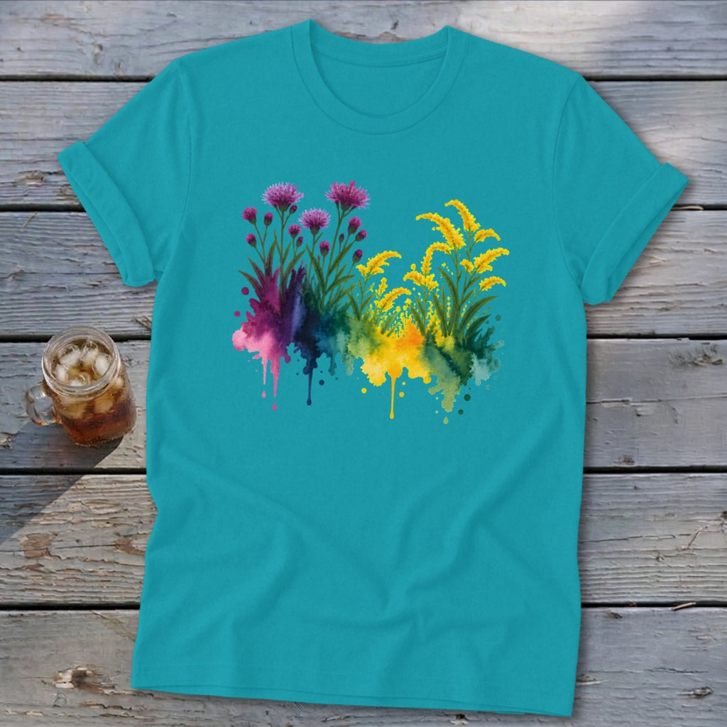 Turquoise t-shirt with watercolor floral design in purple and yellow.