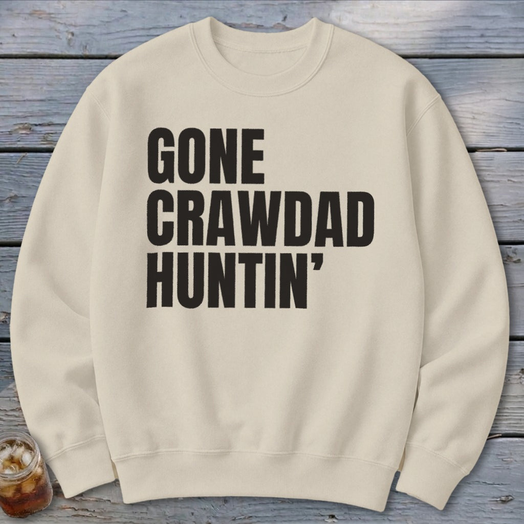Cream sweatshirt with black text reading "GONE CRAWDAD HUNTIN'".