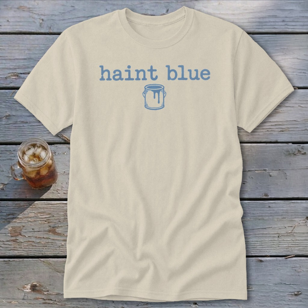 Cream t-shirt with blue "haint blue" text and paint can graphic.