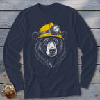 Black bear wearing a yellow hard hat with a headlamp illustration on a navy long sleeve shirt.