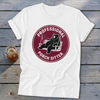 A white crewneck t-shirt featuring a maroon circular graphic with a black bear lounging on a porch swing and the text Professional Porch Sitter.