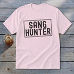 Pink t-shirt with black text inside a rectangle reading "SANG HUNTER".