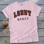 Pink t-shirt with "LORDY MERCY" text in distressed red and black lettering.