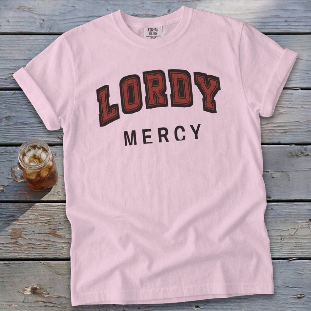 Pink t-shirt with "LORDY MERCY" text in distressed red and black lettering.