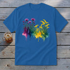 Blue t-shirt with watercolor floral design featuring pink and yellow wildflowers.