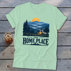 Light green t-shirt with "The Home Place" text and a sunset mountain landscape design.