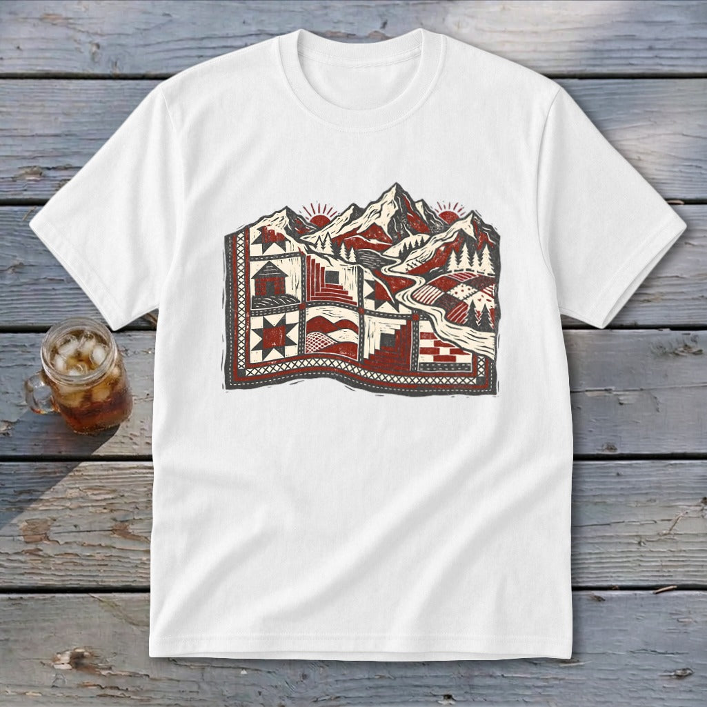 White short-sleeve t-shirt featuring a red, black, and white graphic of mountains and a patterned landscape.