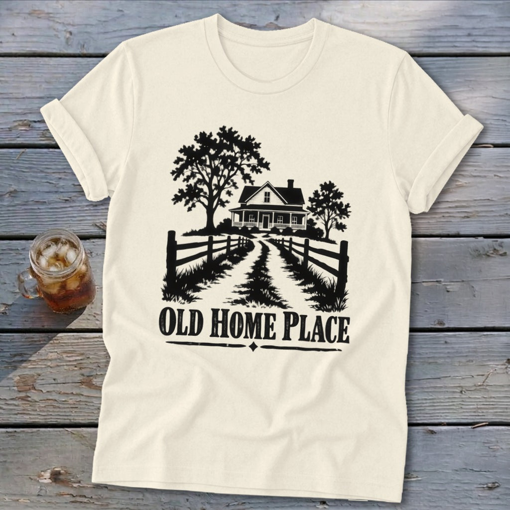 Cream t-shirt with black graphic of a house, trees, fence, and text "OLD HOME PLACE".