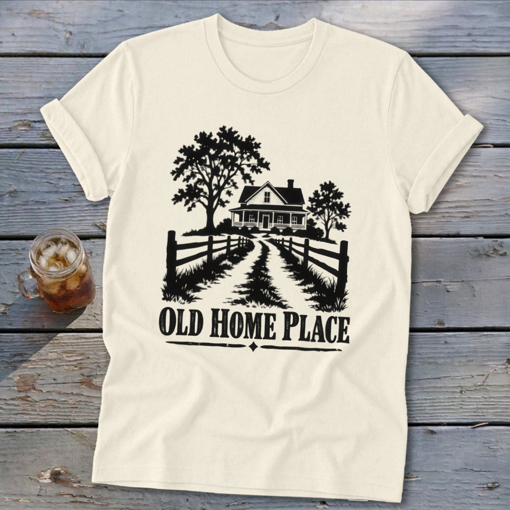 Cream t-shirt with black graphic of a house, trees, fence, and text "OLD HOME PLACE".