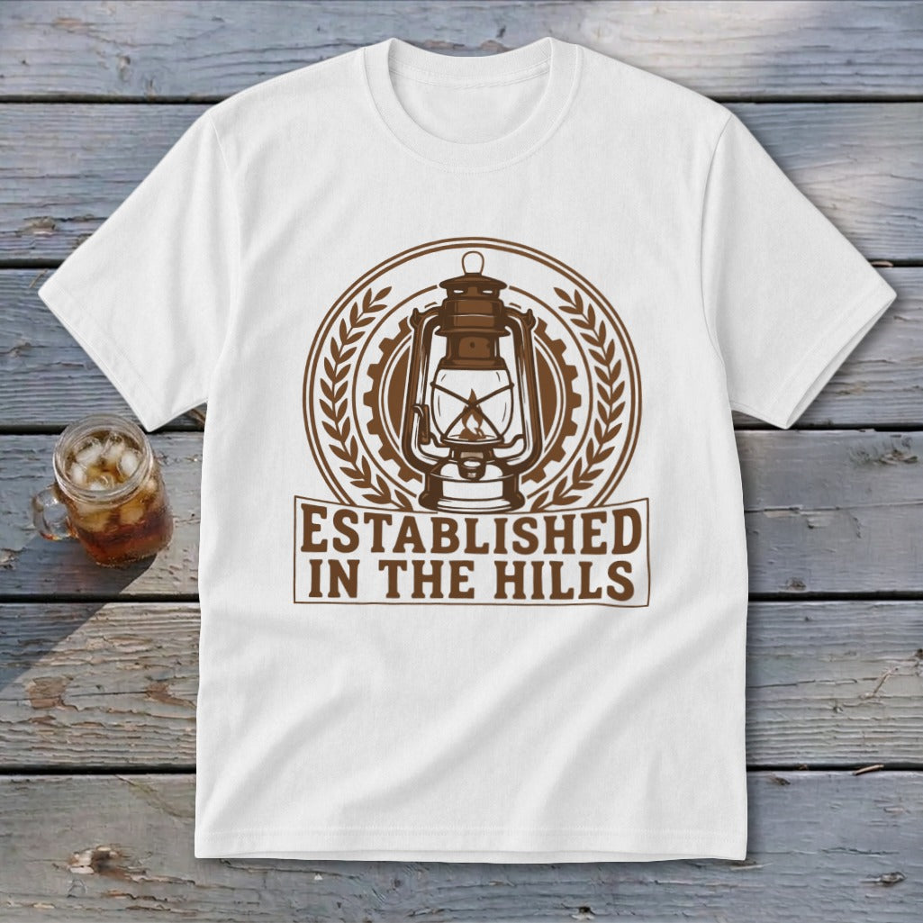 White t-shirt with a brown lantern and "ESTABLISHED IN THE HILLS" text.