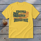 Yellow t-shirt with "VIRGINIA RAISED AMERICAN MADE" text and distressed American flag graphic.