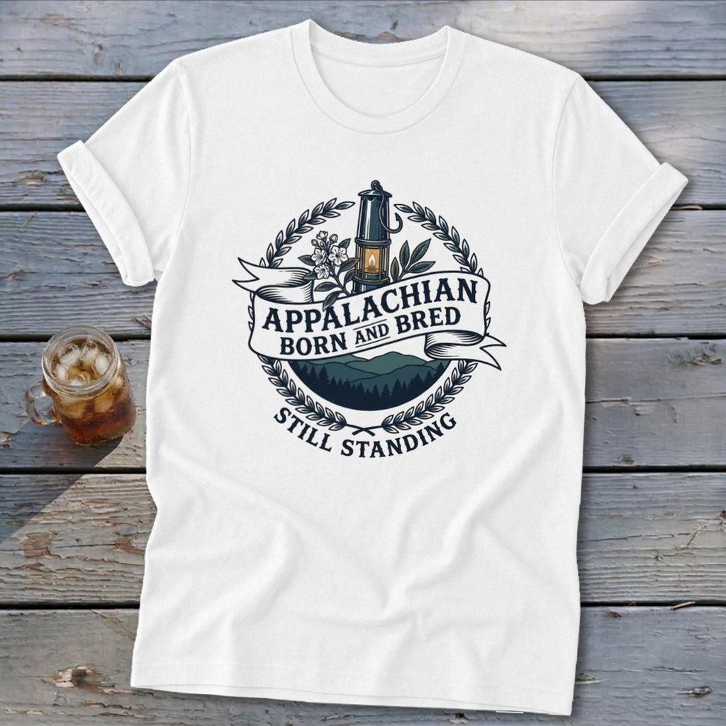 White t-shirt with "Appalachian Born and Bred Still Standing" text and mountain landscape graphic.