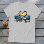 White t-shirt with a heart and mountain landscape graphic that reads "Appalachia Strong."