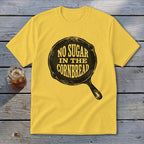 Yellow t-shirt with "No Sugar in the Cornbread" text inside a cast iron skillet.